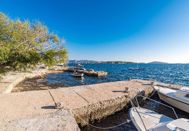 Ferienwohnung in Šibenik-Brodarica - Apartments Barbarella - Apartment mit zwei Schlafzimmern und Gartenblick A1 Ferienwohnung in Šibenik-Brodarica - Apartments Barbarella - Apartment mit zwei Schlafzimmern und Gartenblick A1