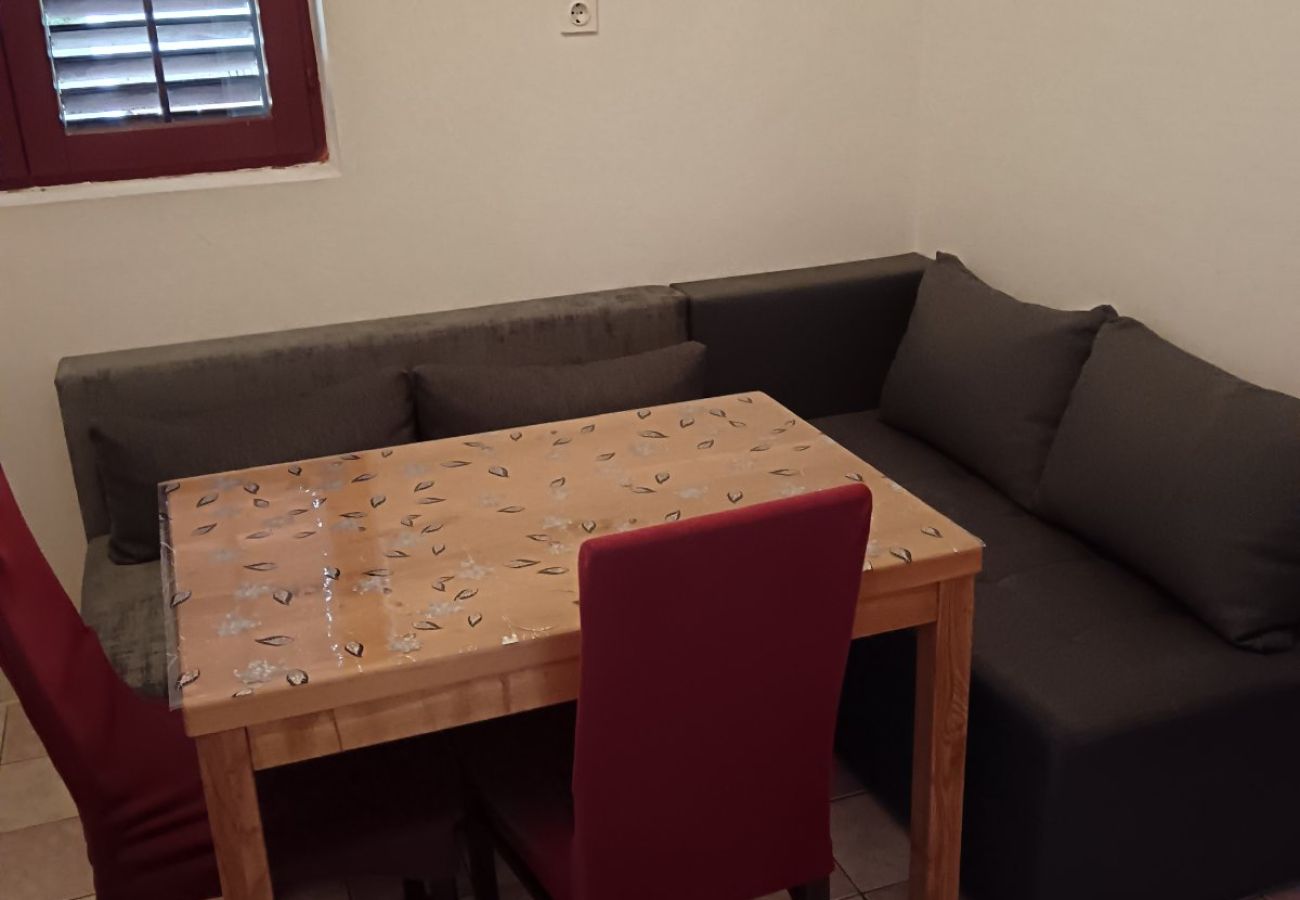 Ferienwohnung in Tisno - Apartments Tisno - Ein-Zimmer-Wohnung (links)