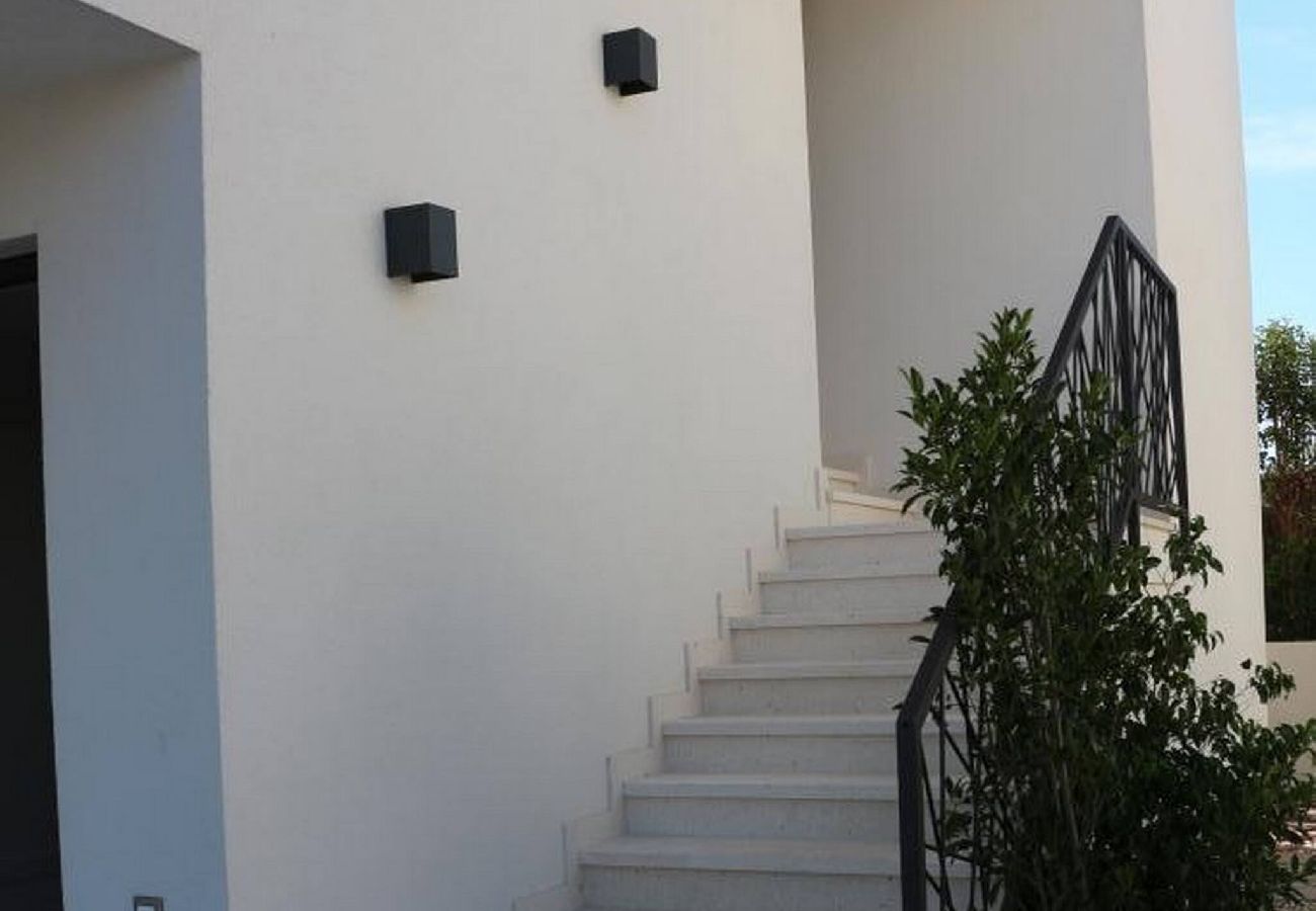 Apartment in Ugljan - Apartments Marvi - one bedroom apartment with a sea view (Right)