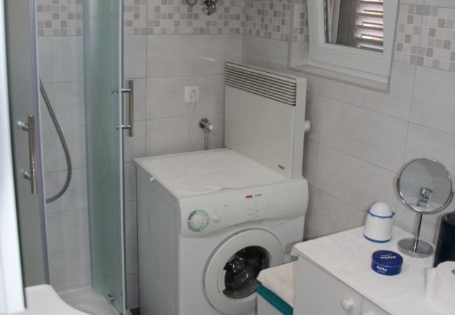Apartment in Vodice - Apartments Gojevic - two bedroom apartment with a garden view A2 Apartment in Vodice - Apartments Gojevic - two bedroom apartment with a garden view A2