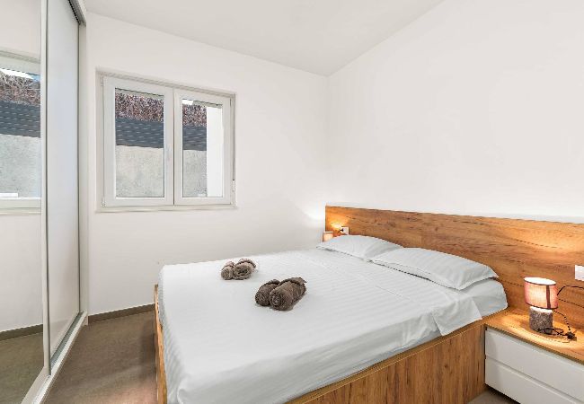 Apartment in Šibenik-Brodarica - Apartments Velic - Two bedroom apartment with a terrace A Apartment in Šibenik-Brodarica - Apartments Velic - Two bedroom apartment with a terrace A
