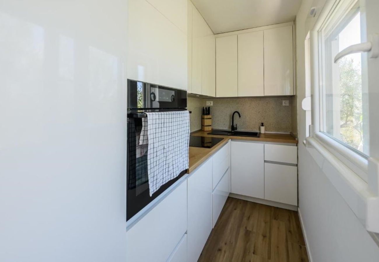 House in Žaborić - Holiday Home Maslina - Three bedroom house with a garden view